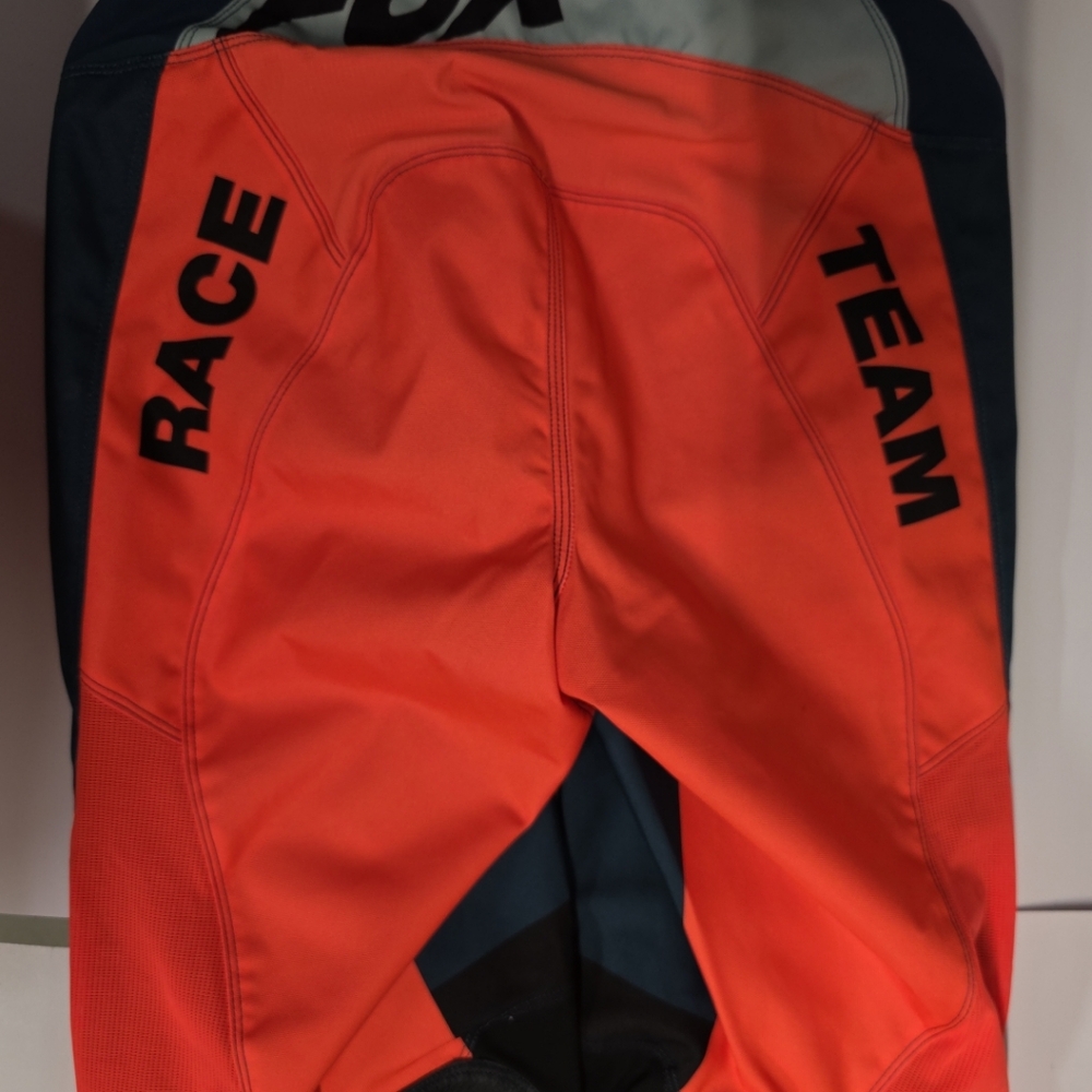 Fox 180 Mens Racing Pants Size 36 Turquoise And Orange - Picture 2 of 12